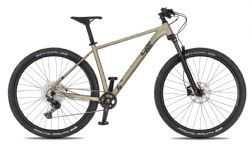 Horské kolo 4EVER TRINITY TEAM satin sand 2026